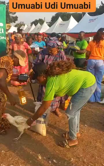 Volunteers handing out supplies to widows at a Darlstina Foundation outreach event