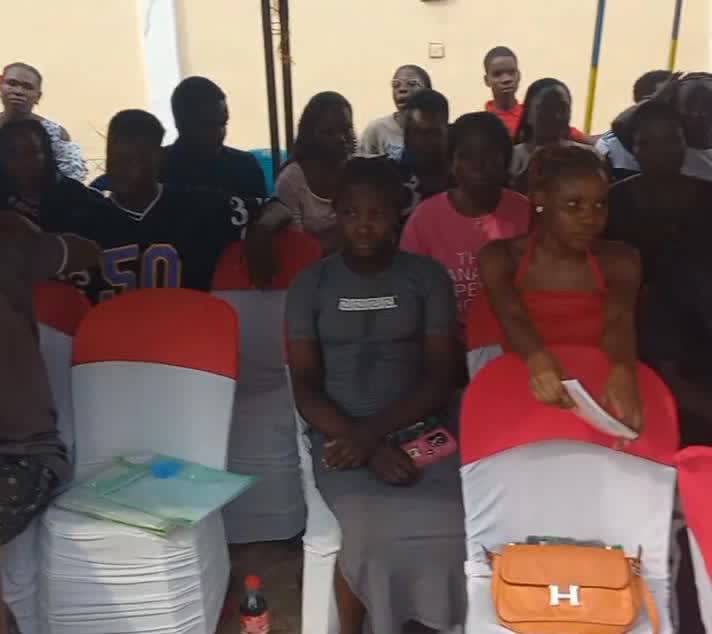 Wide view of a Darlstina Foundation community outreach event under canopies